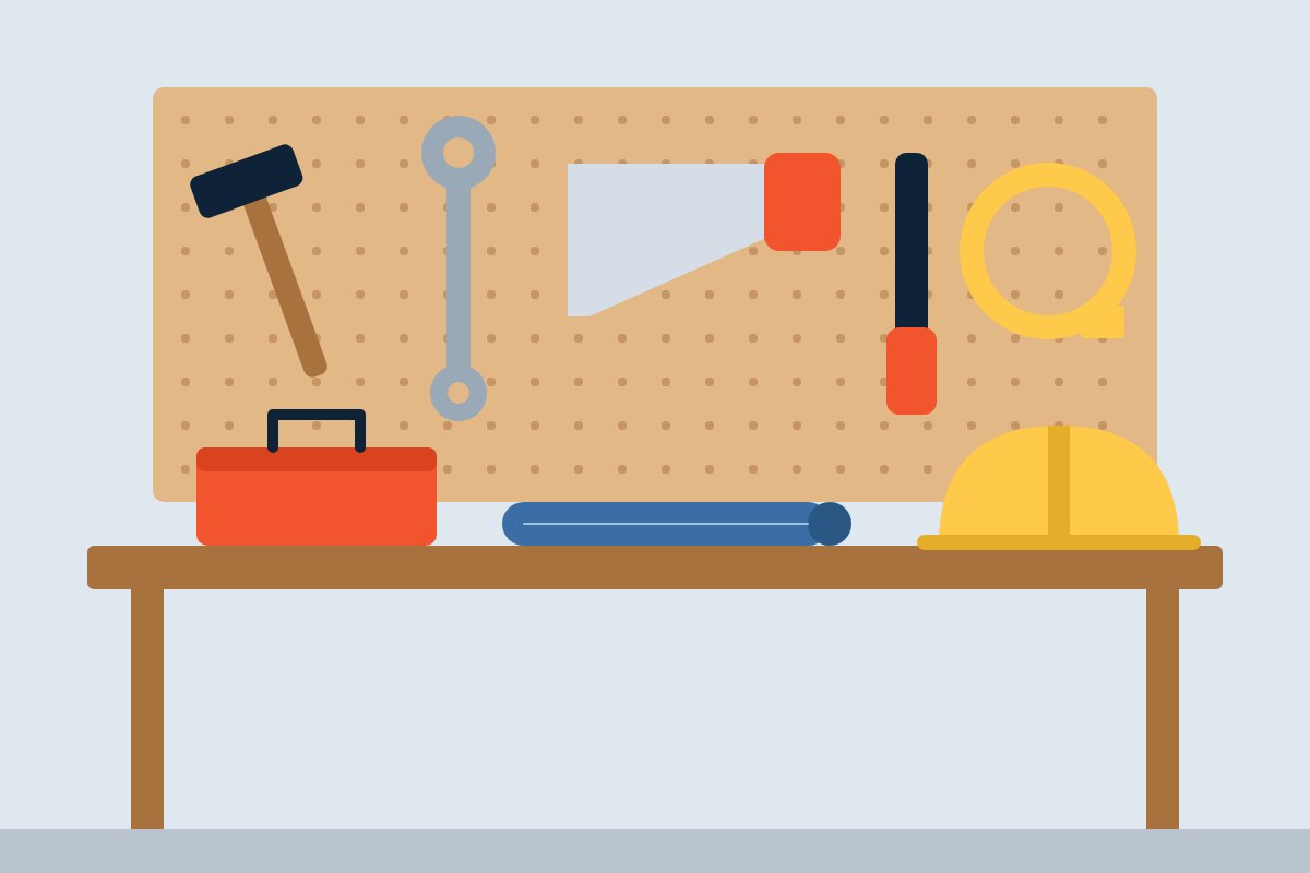 Workbench with tools, toolbox and hard hat